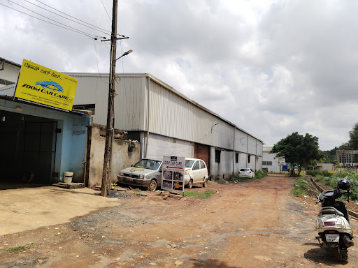 ZOOM CAR CARE . 2.0 CAR WASHING CENTRE.GOKUL ROAD HUBLI.